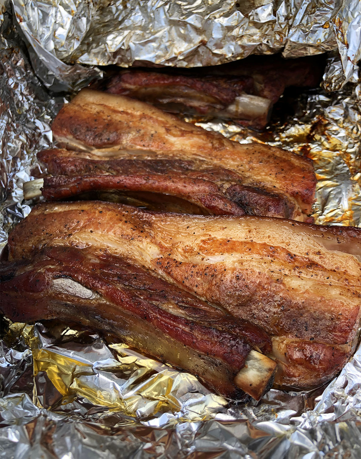 https://www.specialtygashouse.com/wp-content/uploads/2021/09/pork-belly-ribs-wrapped.jpg