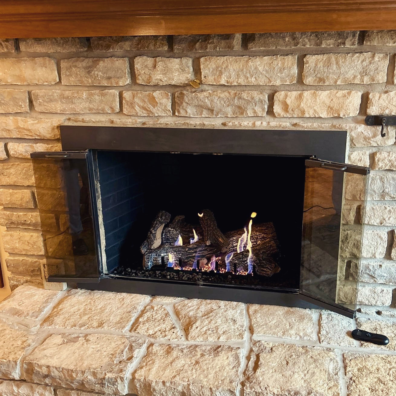 vent free ventless gas logs installed in a fireplace